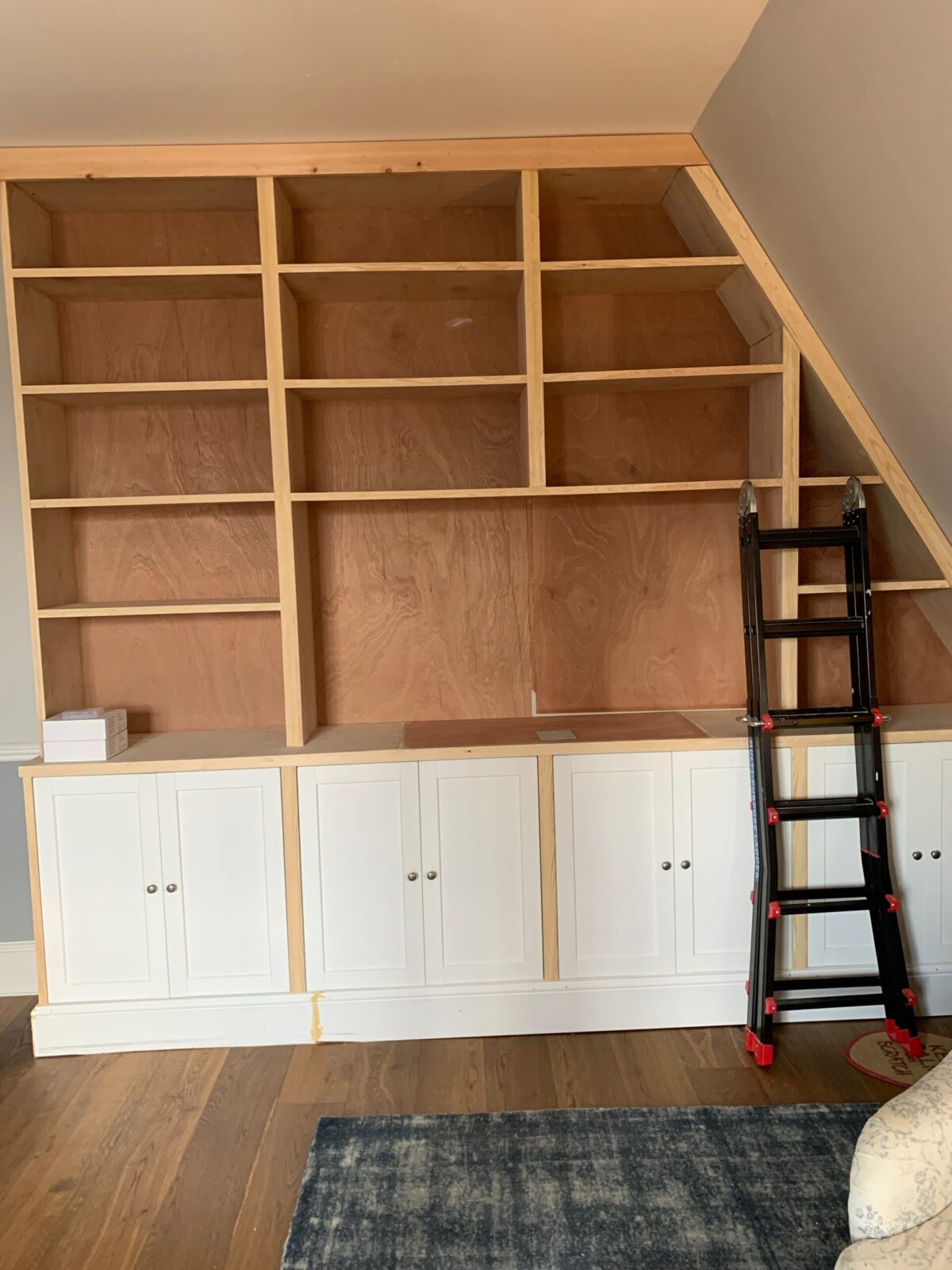 DIY Custom Shelves in the Lounge, Part 4: Decorative Trim and an Uneven Floor